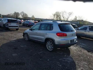 2013 Volkswagen Tiguan S with VIN WVGAV3AX0DW572915, listed as a IAAI auction lot 41937763 with 65,136 mi miles and . Bid and sale history available at DreamBid. Image 3.