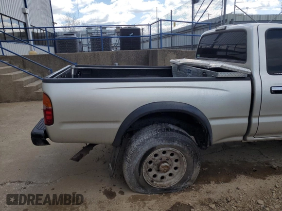 2001 Toyota Tacoma z VIN 5TEPM62N91Z836597, wystawiony jako Copart lot #53106165 z przebiegiem 263 107 mil mil oraz Szkoda całkowita • Salvage title. Historia ofert i sprzedaży dostępna na DreamBid. Obrazek 10.