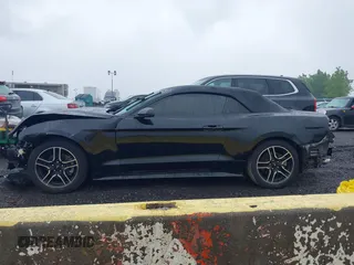2020 Ford Mustang EcoBoost z VIN 1FATP8UH7L5131625, wystawiony jako IAAI lot #42295906 z przebiegiem 74 572 mil mil oraz . Historia ofert i sprzedaży dostępna na DreamBid. Obrazek 13.