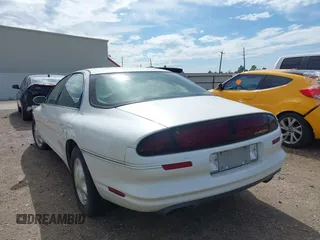 1996 Oldsmobile Aurora z VIN 1G3GR62C1T4121552, wystawiony jako IAAI lot #40766504 z przebiegiem 75 434 mil mil oraz . Historia ofert i sprzedaży dostępna na DreamBid. Obrazek 6.