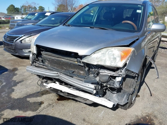 2007 Honda CR-V EX-L with VIN JHLRE38737C026941, listed as a IAAI auction lot 41826105 with 186,537 mi miles. Bid and sale history available at carsss.com. Image 6.