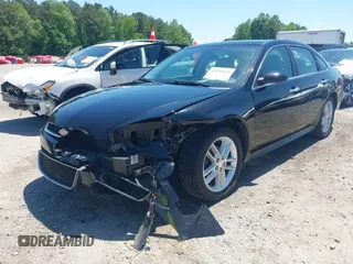2014 Chevrolet Impala LTZ with VIN 2G1WC5E39E1168726, listed as a IAAI auction lot 42133295 with 146,902 mi miles and . Bid and sale history available at DreamBid. Image 17.