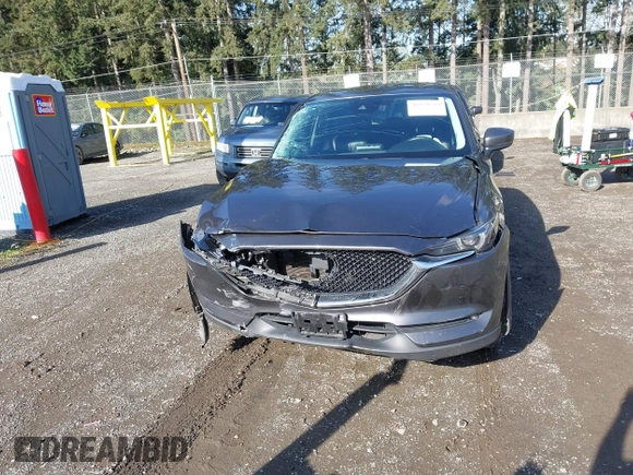 2019 Mazda CX-5 Grand Touring with VIN JM3KFBDM3K1677208, listed as a IAAI auction lot 41929299 with 58,163 mi miles. Bid and sale history available at carsss.com. Image 12.