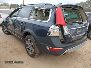 2015 Volvo XC70 T5 Drive-E Premier with VIN YV440MBK7F1209968, listed as a IAAI auction lot 41914571 with 69,668 mi miles and . Bid and sale history available at DreamBid. Image 3.