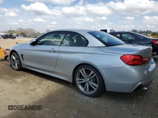 2015 BMW 4 Series 435i with VIN WBA3T3C57FP939561, listed as a Copart auction lot 48728785 with 116,009 mi miles and Salvage Title. Bid and sale history available at carsss.com. Image 2.