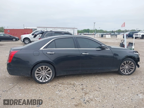 2014 Cadillac CTS Luxury AWD with VIN 1G6AX5SX9E0197395, listed as a IAAI auction lot 42211452 with 90,657 mi miles and . Bid and sale history available at DreamBid. Image 13.