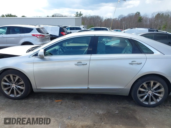 2013 Cadillac XTS Luxury z VIN 2G61P5S33D9170453, wystawiony jako IAAI lot #41928607 z przebiegiem 68 094 mil mil oraz . Historia ofert i sprzedaży dostępna na DreamBid. Obrazek 14.