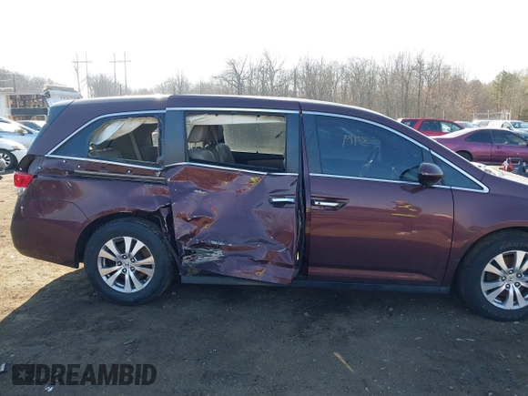 2014 Honda Odyssey EX-L with VIN 5FNRL5H60EB009083, listed as a IAAI auction lot 41633419 with 219,930 mi miles and . Bid and sale history available at carsss.com. Image 18.