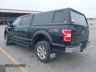 2018 Ford F-150 XL with VIN 1FTEW1E5XJKC37082, listed as a IAAI auction lot 42335721 with 167,401 mi miles and . Bid and sale history available at DreamBid. Image 3.
