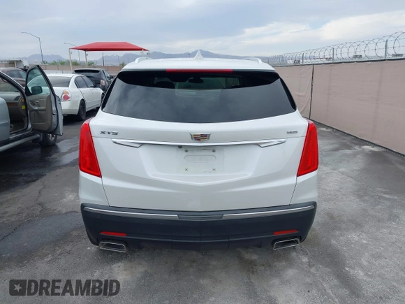 2018 Cadillac XT5 Luxury FWD with VIN 1GYKNCRS2JZ185644, listed as a IAAI auction lot 41912079 with 82,728 mi miles and . Bid and sale history available at carsss.com. Image 16.