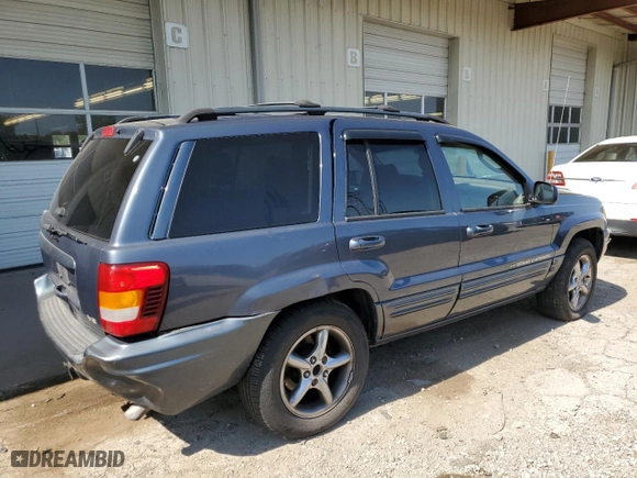 2003 Jeep Grand Cherokee Limited with VIN 1J8GW58N73C605929, listed as a Copart auction lot 70755024 with 173,147 mi miles and Salvage Title. Bid and sale history available at carsss.com. Image 3.