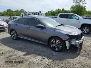 2018 Honda Civic EX-T z VIN 19XFC1F32JE200959, wystawiony jako Copart lot #58049855 z przebiegiem 95 123 mil mil oraz Szkoda całkowita • Salvage title. Historia ofert i sprzedaży dostępna na DreamBid. Obrazek 4.