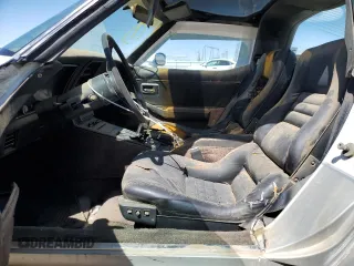 1982 Chevrolet Corvette z VIN 1G1AY8781C5121238, wystawiony jako Copart lot #47667705 z przebiegiem 34 307 mil mil oraz Czysty tytuł • Clean title. Historia ofert i sprzedaży dostępna na DreamBid. Obrazek 7.