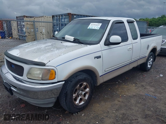 1997 Ford F-150 XL z VIN 1FTEX17L1VNB15658, wystawiony jako IAAI lot #42353422 z przebiegiem 217 975 mil mil oraz . Historia ofert i sprzedaży dostępna na DreamBid. Obrazek 6.