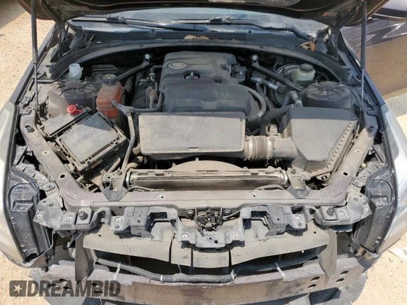 2014 Cadillac ATS Standard RWD z VIN 1G6AA5RA7E0124870, wystawiony jako Copart lot #55724655 z przebiegiem 114 694 mil mil oraz Szkoda całkowita • Salvage title. Historia ofert i sprzedaży dostępna na DreamBid. Obrazek 11.