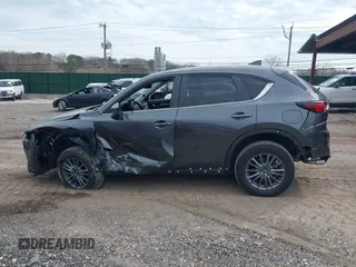 2021 Mazda CX-5 Touring with VIN JM3KFBCM8M0492145, listed as a IAAI auction lot 39077248 with 20,408 mi miles. Bid and sale history available at carsss.com. Image 14.