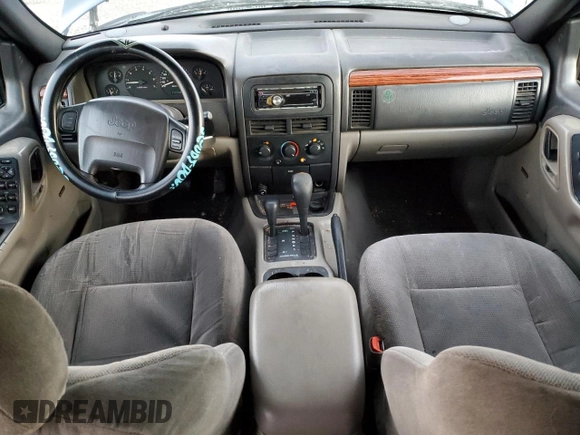 1999 Jeep Grand Cherokee Laredo с VIN 1J4GW58N6XC784679, выставлен на аукционе Copart как лот 85345304 с пробегом 234 584 миль миль и Списание • Salvage title. История ставок и продаж доступна на DreamBid. Изображение 8.