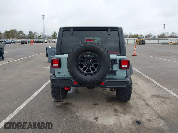 2023 Jeep Wrangler Rubicon with VIN 1C4JJXFG7PW654564, listed as a IAAI auction lot 41833534 with 22,277 mi miles and . Bid and sale history available at DreamBid. Image 16.