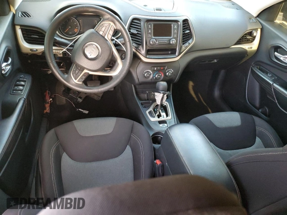 2015 Jeep Cherokee Sport z VIN 1C4PJLAB6FW580387, wystawiony jako Copart lot #50241815 z przebiegiem 99 999 mil mil oraz Czysty tytuł • Clean title. Historia ofert i sprzedaży dostępna na DreamBid. Obrazek 8.