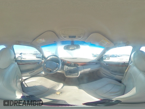 2004 Cadillac DeVille z VIN 1G6KD57Y14U149606, wystawiony jako Copart lot #51230955 z przebiegiem Nie podano mil oraz Szkoda całkowita • Salvage title. Historia ofert i sprzedaży dostępna na DreamBid. Obrazek 13.