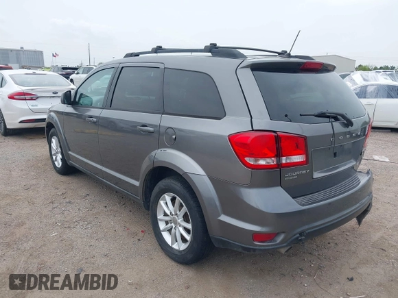 2013 Dodge Journey SXT with VIN 3C4PDDBGXDT650886, listed as a IAAI auction lot 41864331 with 224,579 mi miles and . Bid and sale history available at DreamBid. Image 3.