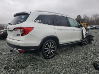 2020 Honda Pilot Touring 8-Passenger with VIN 5FNYF6H95LB053631, listed as a Copart auction lot 47732865 with 67,728 mi miles and Salvage Title. Bid and sale history available at DreamBid. Image 3.