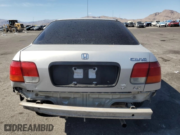 1997 Honda Civic LX z VIN JHMEJ6671VS036302, wystawiony jako Copart lot #54006905 z przebiegiem 201 909 mil mil oraz Szkoda całkowita • Salvage title. Historia ofert i sprzedaży dostępna na DreamBid. Obrazek 6.