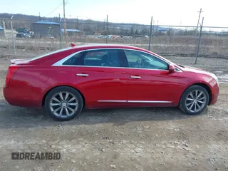 2013 Cadillac XTS z VIN 2G61N5S37D9177217, wystawiony jako IAAI lot #41747566 z przebiegiem 140 946 mil mil oraz . Historia ofert i sprzedaży dostępna na DreamBid. Obrazek 13.
