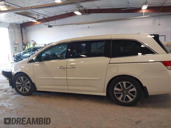 2015 Honda Odyssey Touring Elite with VIN 5FNRL5H97FB060060, listed as a IAAI auction lot 41829864 with Not Provided miles and . Bid and sale history available at DreamBid. Image 13.