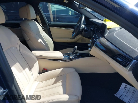 2019 BMW 5 Series 530e iPerformance with VIN WBAJA9C59KB389898, listed as a IAAI auction lot 41479595 with 90,965 mi miles. Bid and sale history available at carsss.com. Image 5.