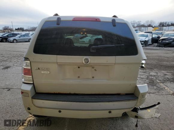 2009 Mercury Mariner Premier z VIN 4M2CU87739KJ21572, wystawiony jako Copart lot #83665504 z przebiegiem 181 858 mil mil oraz Szkoda całkowita • Salvage title. Historia ofert i sprzedaży dostępna na DreamBid. Obrazek 6.