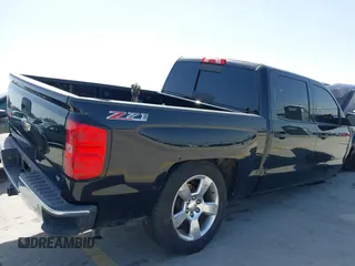 2014 Chevrolet Silverado 1500 LT with VIN 3GCUKREH8EG210945, listed as a IAAI auction lot 41718435 with 106,320 mi miles and . Bid and sale history available at DreamBid. Image 19.