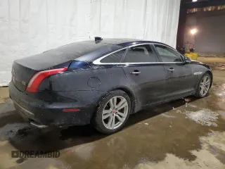 2016 Jaguar XJ with VIN SAJXJ1GD2G8V98776, listed as a Copart auction lot 41959995 with 77,391 mi miles and Salvage title. Bid and sale history available at DreamBid. Image 3.