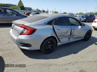 2020 Honda Civic LX z VIN 19XFC2F6XLE209685, wystawiony jako Copart lot #59595335 z przebiegiem Nie podano mil oraz Szkoda całkowita • Salvage title. Historia ofert i sprzedaży dostępna na DreamBid. Obrazek 3.