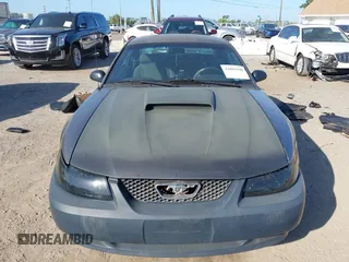 2001 Ford Mustang Standard with VIN 1FAFP40461F264327, listed as a IAAI auction lot 42002990 with 316,107 mi miles. Bid and sale history available at carsss.com. Image 11.