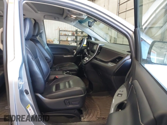 2015 Toyota Sienna SE with VIN 5TDXK3DC9FS527667, listed as a IAAI auction lot 41977729 with 230,933 mi miles and . Bid and sale history available at DreamBid. Image 5.