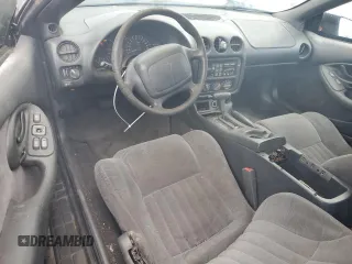 1999 Pontiac Firebird Firebird z VIN 2G2FS22K6X2208489, wystawiony jako Copart lot #79930994 z przebiegiem 181 964 mil mil oraz Czysty tytuł • Clean title. Historia ofert i sprzedaży dostępna na DreamBid. Obrazek 8.