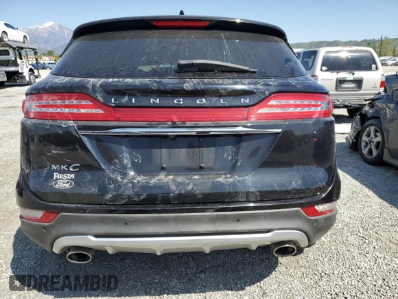 2019 Lincoln MKC Reserve with VIN 5LMCJ3C98KUL22377, listed as a Copart auction lot 52004595 with 60,074 mi miles and Salvage Title. Bid and sale history available at DreamBid. Image 6.