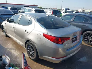 2011 Kia Optima LX with VIN KNAGM4A75B5127965, listed as a IAAI auction lot 40544326 with 207,760 mi miles. Bid and sale history available at carsss.com. Image 3.