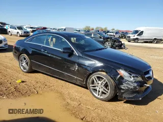 2015 Mercedes-Benz E 400 with VIN WDDKJ6HB7FF300175, listed as a Copart auction lot 82913174 with 52,427 mi miles and Salvage title. Bid and sale history available at DreamBid. Image 4.
