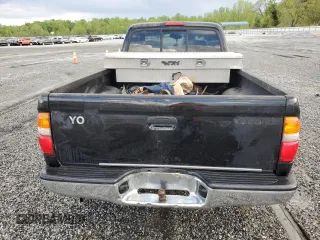 2004 Toyota Tacoma z VIN 5TEVL52N74Z451886, wystawiony jako Copart lot #52329405 z przebiegiem 240 156 mil mil oraz Szkoda całkowita • Salvage title. Historia ofert i sprzedaży dostępna na DreamBid. Obrazek 6.