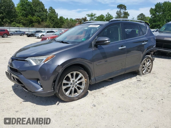 2016 Toyota RAV4 Limited z VIN JTMDFREVXGJ076533, wystawiony jako Copart lot #57480995 z przebiegiem 124 626 mil mil oraz Szkoda całkowita • Salvage title. Historia ofert i sprzedaży dostępna na DreamBid. Obrazek 1.