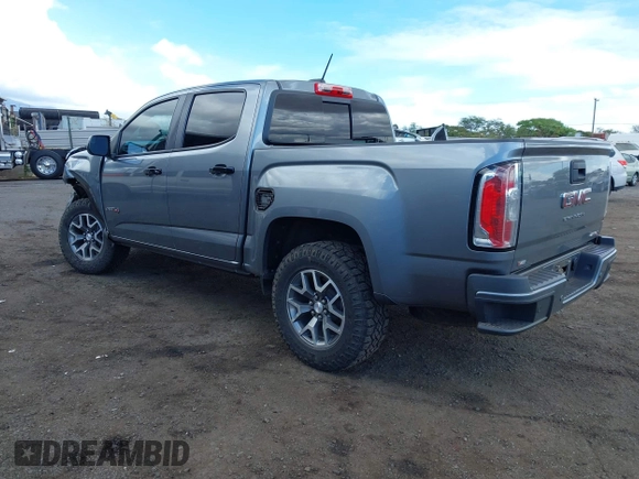 2021 GMC Canyon 4WD AT4 z VIN 1GTG6FEN8M1275345, wystawiony jako IAAI lot #42045878 z przebiegiem 68 299 mil mil oraz . Historia ofert i sprzedaży dostępna na DreamBid. Obrazek 3.
