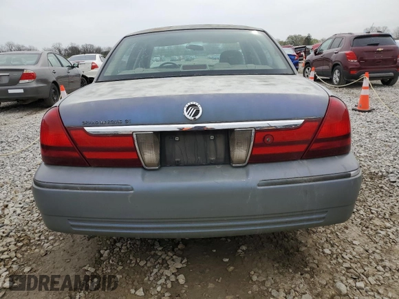2004 Mercury Grand Marquis GS with VIN 2MEFM74W44X659873, listed as a Copart auction lot 51793205 with 115,384 mi miles and Salvage Title. Bid and sale history available at DreamBid. Image 6.