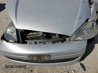2003 Ford Focus LX с VIN 1FAFP33P63W187283, выставлен на аукционе Copart как лот 48803575 с пробегом Не указан миль и Списание • Salvage title. История ставок и продаж доступна на DreamBid. Изображение 13.