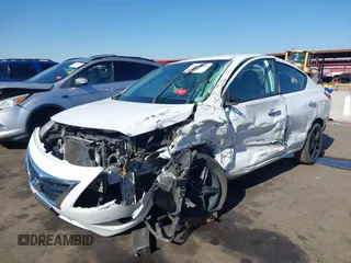 2016 Nissan Versa S Plus with VIN 3N1CN7AP1GL891936, listed as a IAAI auction lot 41363263 with 138,312 mi miles. Bid and sale history available at carsss.com. Image 2.