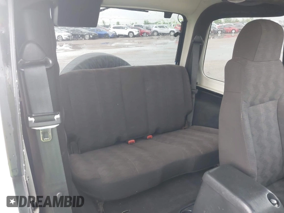 2004 Jeep Wrangler X with VIN 1J4FA39S34P753865, listed as a IAAI auction lot 41948545 with 198,169 mi miles. Bid and sale history available at carsss.com. Image 8.
