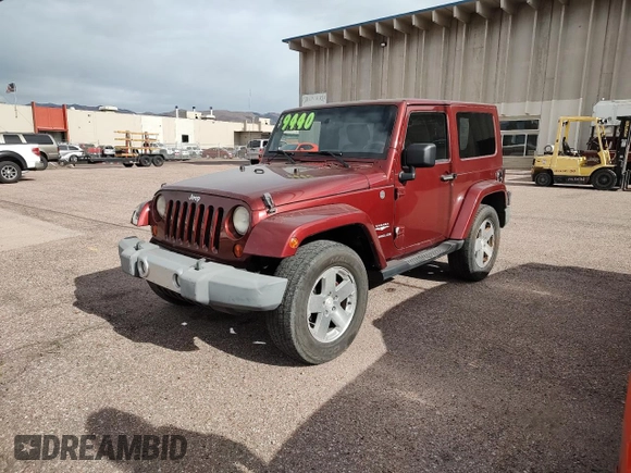 2008 Jeep Wrangler Sahara with VIN 1J4FA54118L537472, listed as a Copart auction lot 57785185 with 121,029 mi miles and Clean title. Bid and sale history available at DreamBid. Image 2.