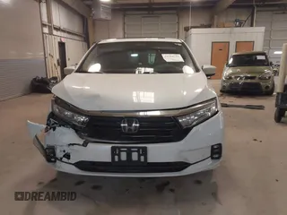 2021 Honda Odyssey Touring with VIN 5FNRL6H80MB026908, listed as a IAAI auction lot 41564765 with 116,453 mi miles. Bid and sale history available at carsss.com. Image 12.