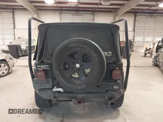 1999 Jeep Wrangler Sahara z VIN 1J4FY49S4XP432567, wystawiony jako IAAI lot #41562455 z przebiegiem Nie podano mil oraz . Historia ofert i sprzedaży dostępna na DreamBid. Obrazek 16.
